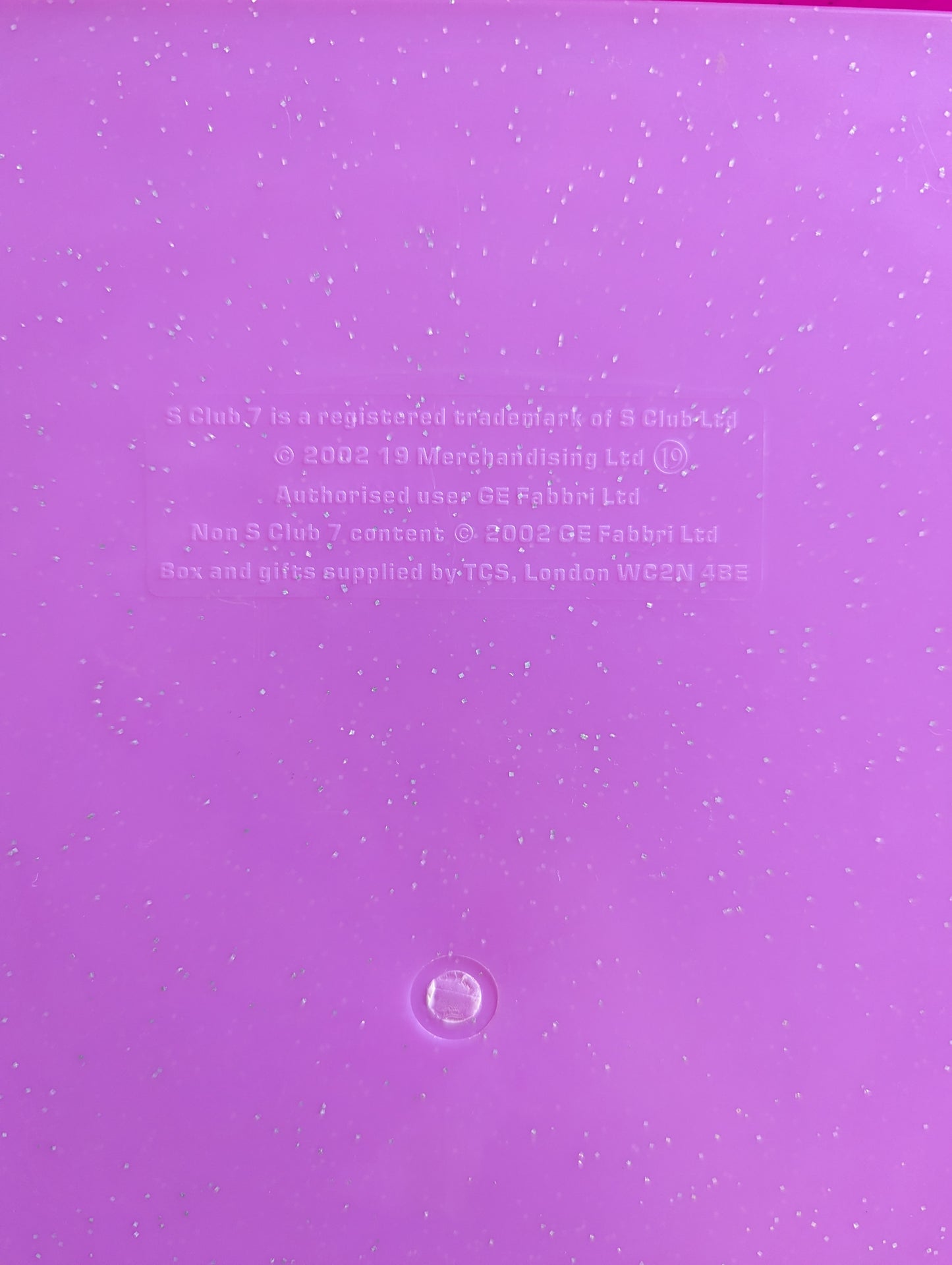 Close up of back of box reads copyright 2002