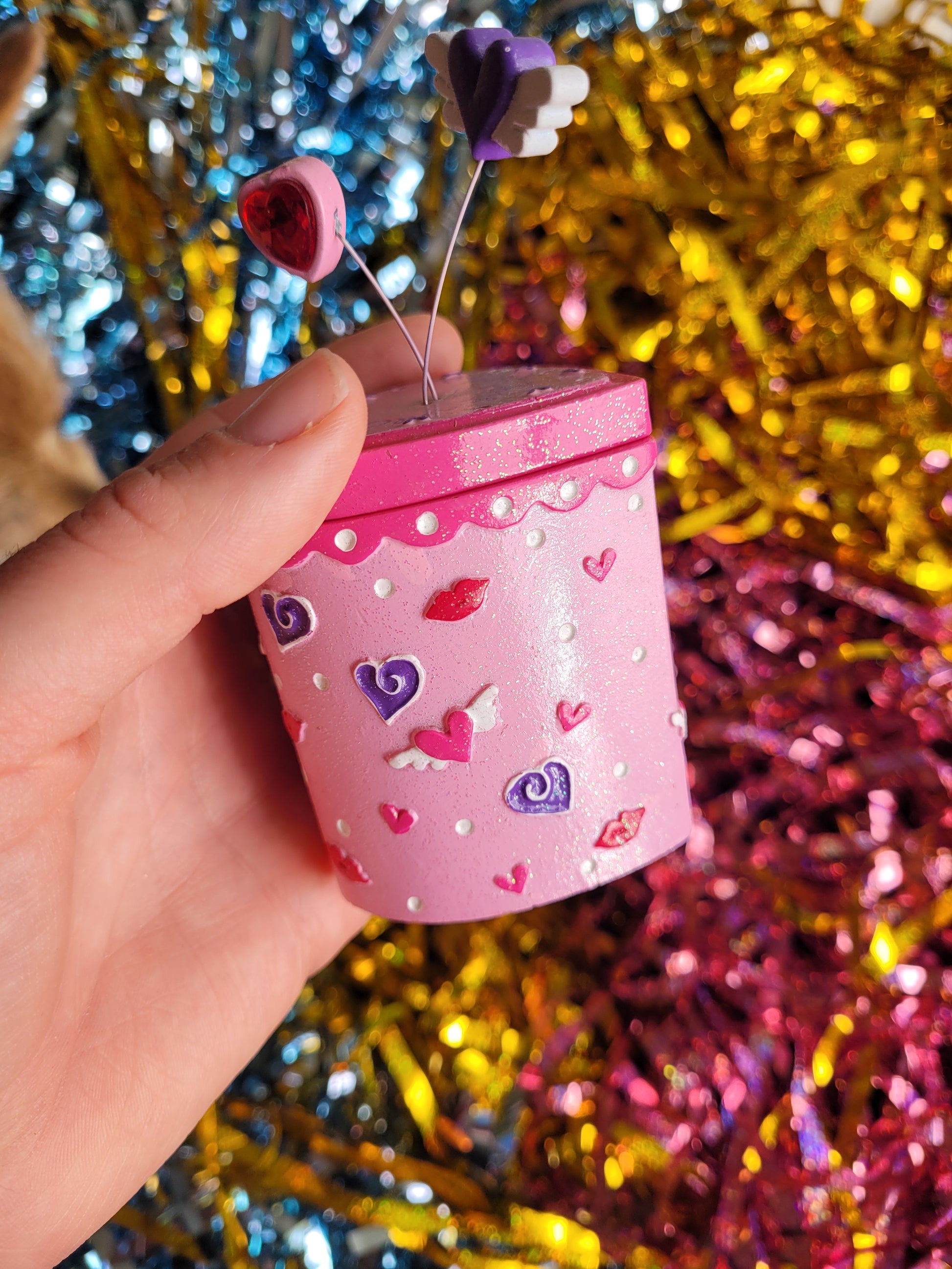 Close up of the glittery pink surface of the trinket box