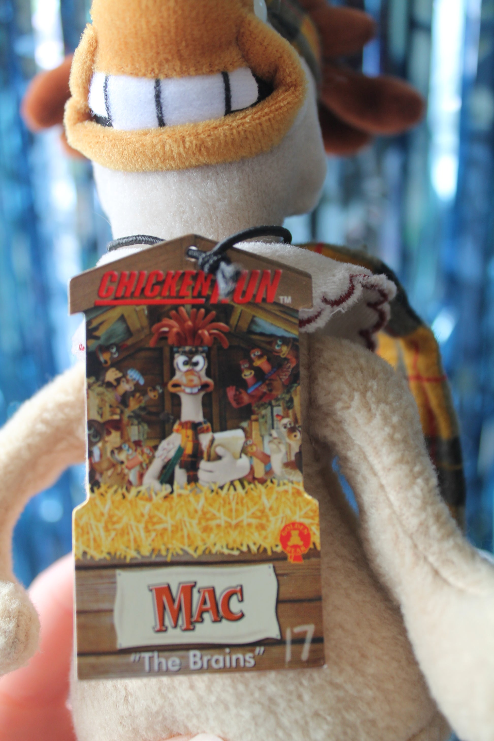 Detail of the front of the tag
Says 'Chicken Run Mac The Brains' with a picture of Mac and the other Chicken Run chickens 