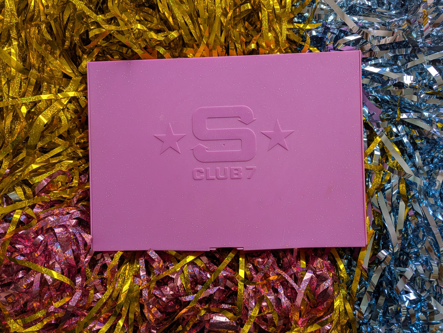Sparkly pink plastic box with 'S Club 7' logo on the front 